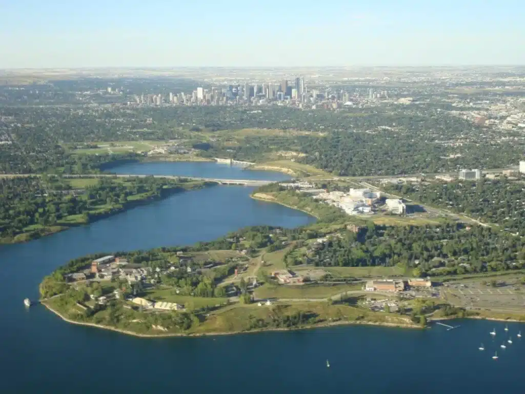 Aerial view of Calgary's Glenmore Reservoir and Heritage Park on a Bragg Creek Helicopter Tour with L R Helicopters